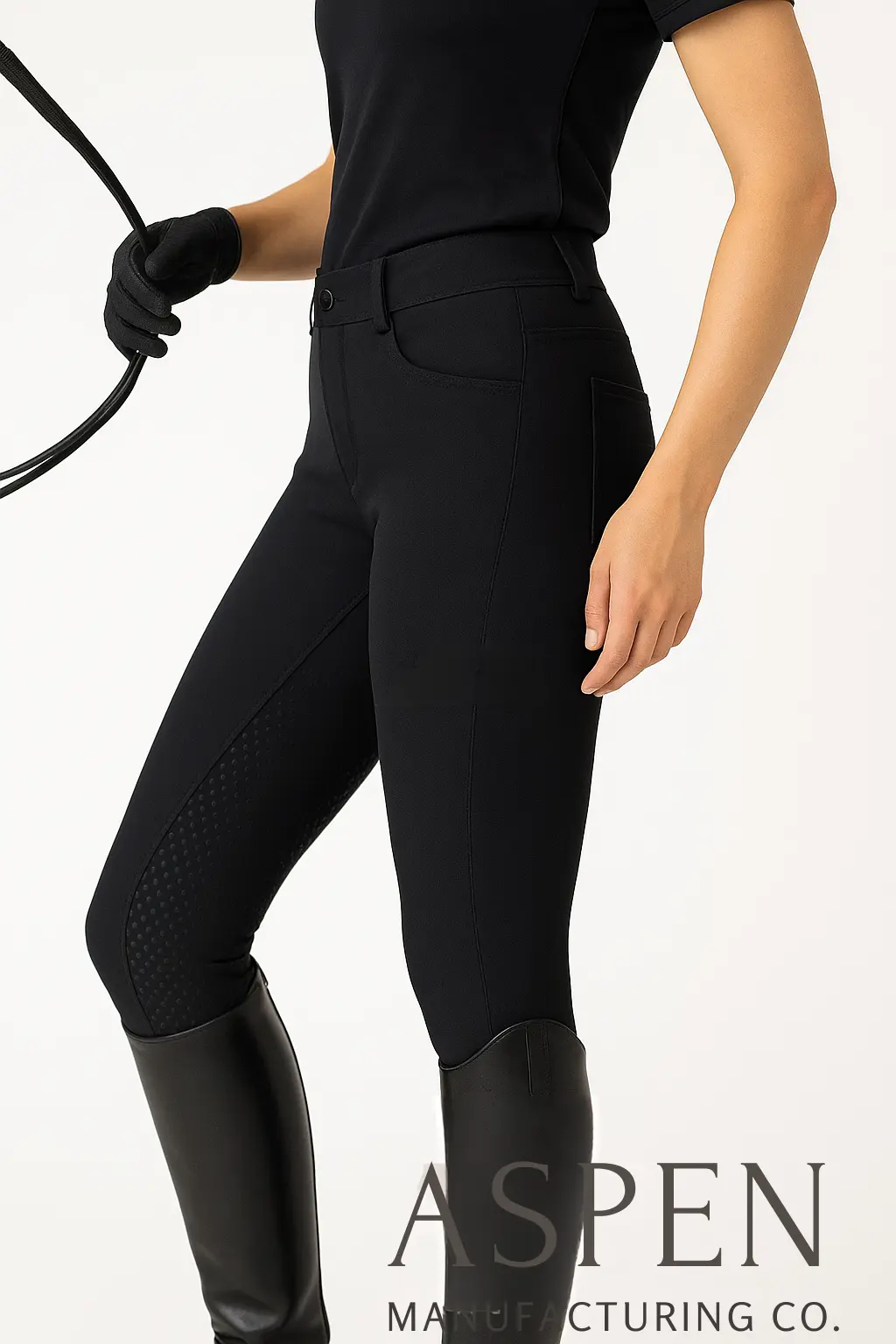 Woman wearing black equestrian breeches