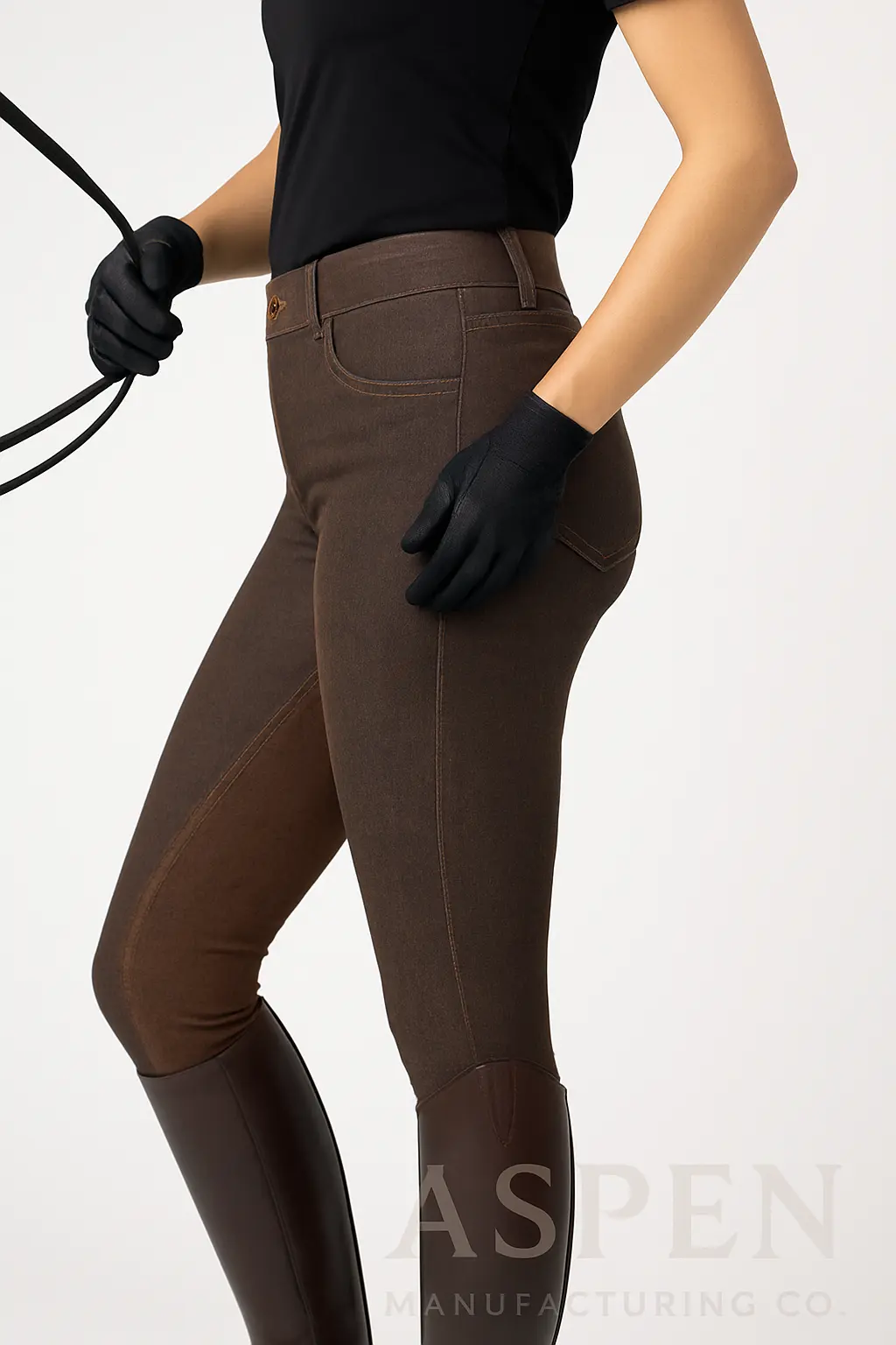 Woman wearing brown denim riding tights